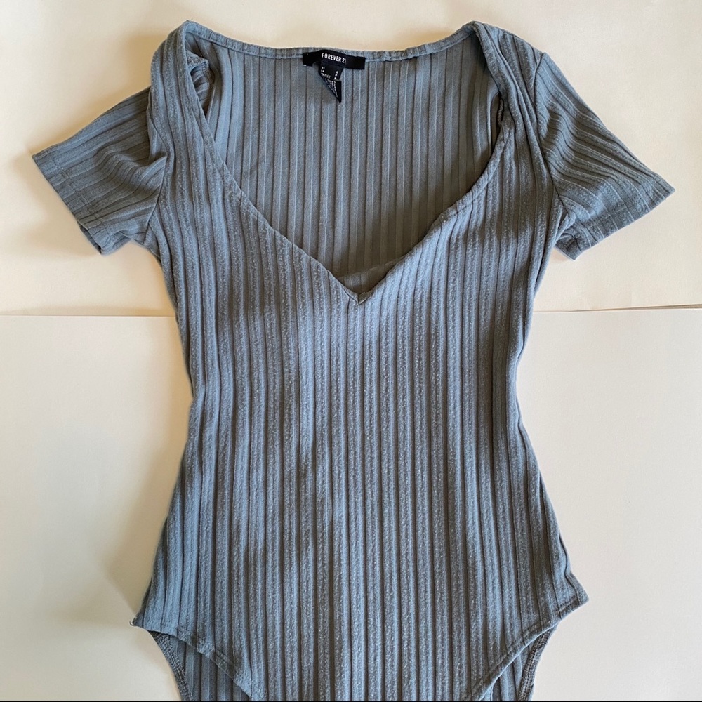 blue/gray body suit